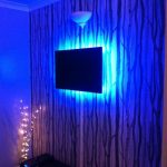 7.5-watt RGB LEDs throw royal-blue backlight from this wall-,ounted TV