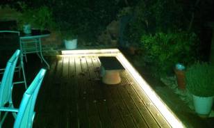 Decking edges lit by LEDs at night