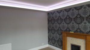 Coving lit by RGB LEDs, set to a warm white mix