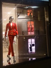 Three small lightboxes in Dior's Christmas shopwindow