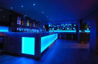 Nightclub back bar with LED lightbox panel